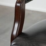 Adjustable black timeless Chesterfield office chair made of cow leather
