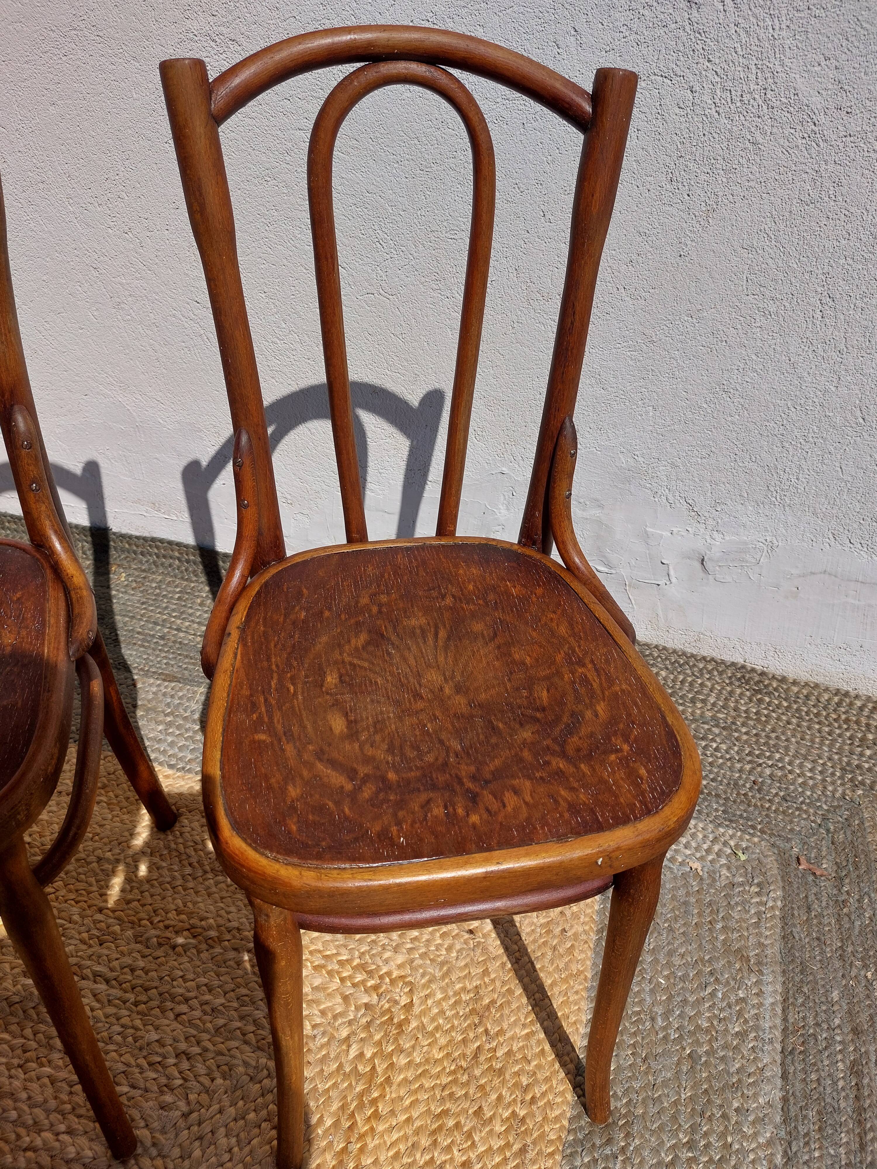 set of 3 curved wooden bistro chairs with patterns