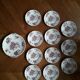 Set of 11 dessert plates and an English ceramic dish