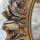 Ancien miroir ovale décor floral