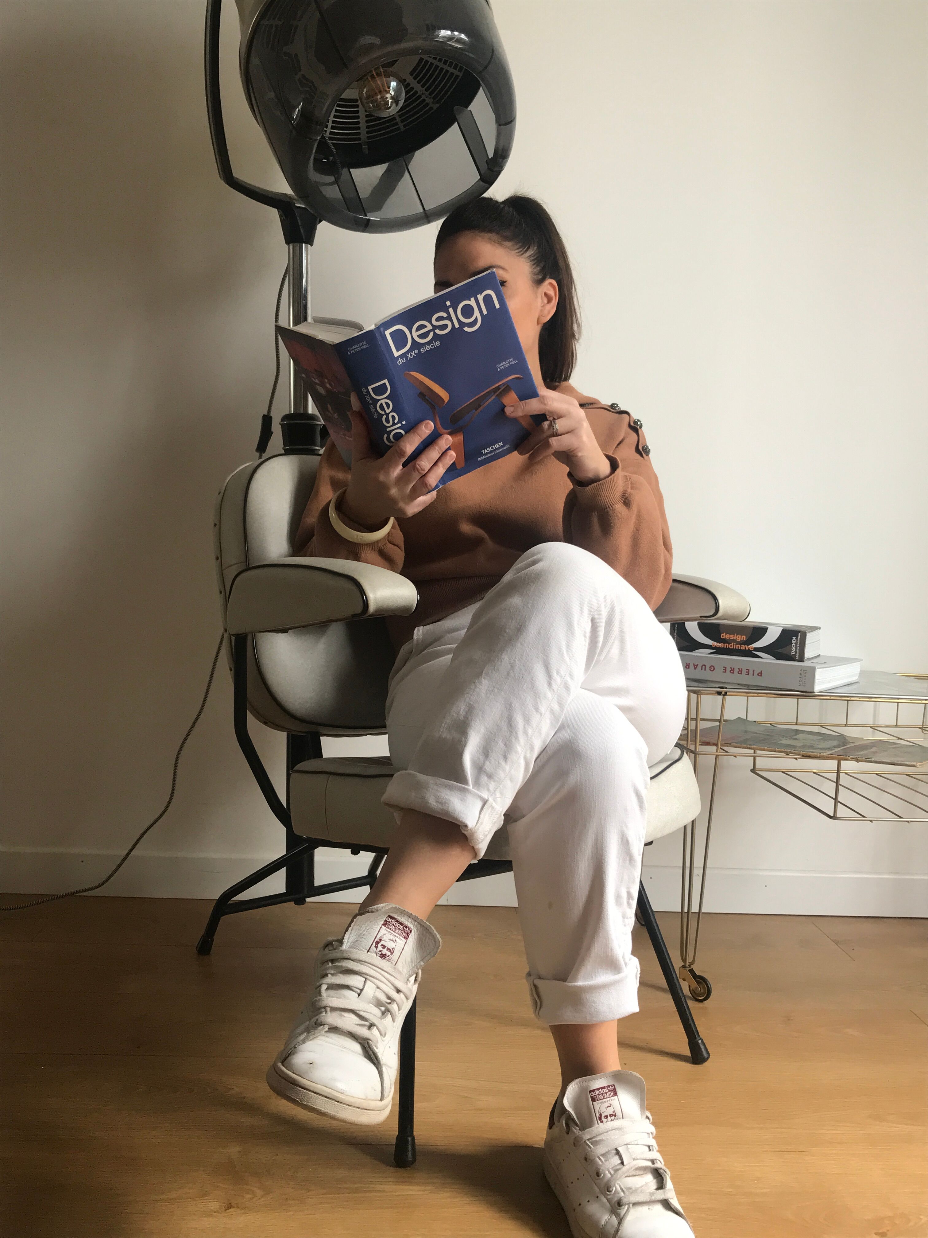 Vintage hairdresser's armchair with helmet transformed into a lamp