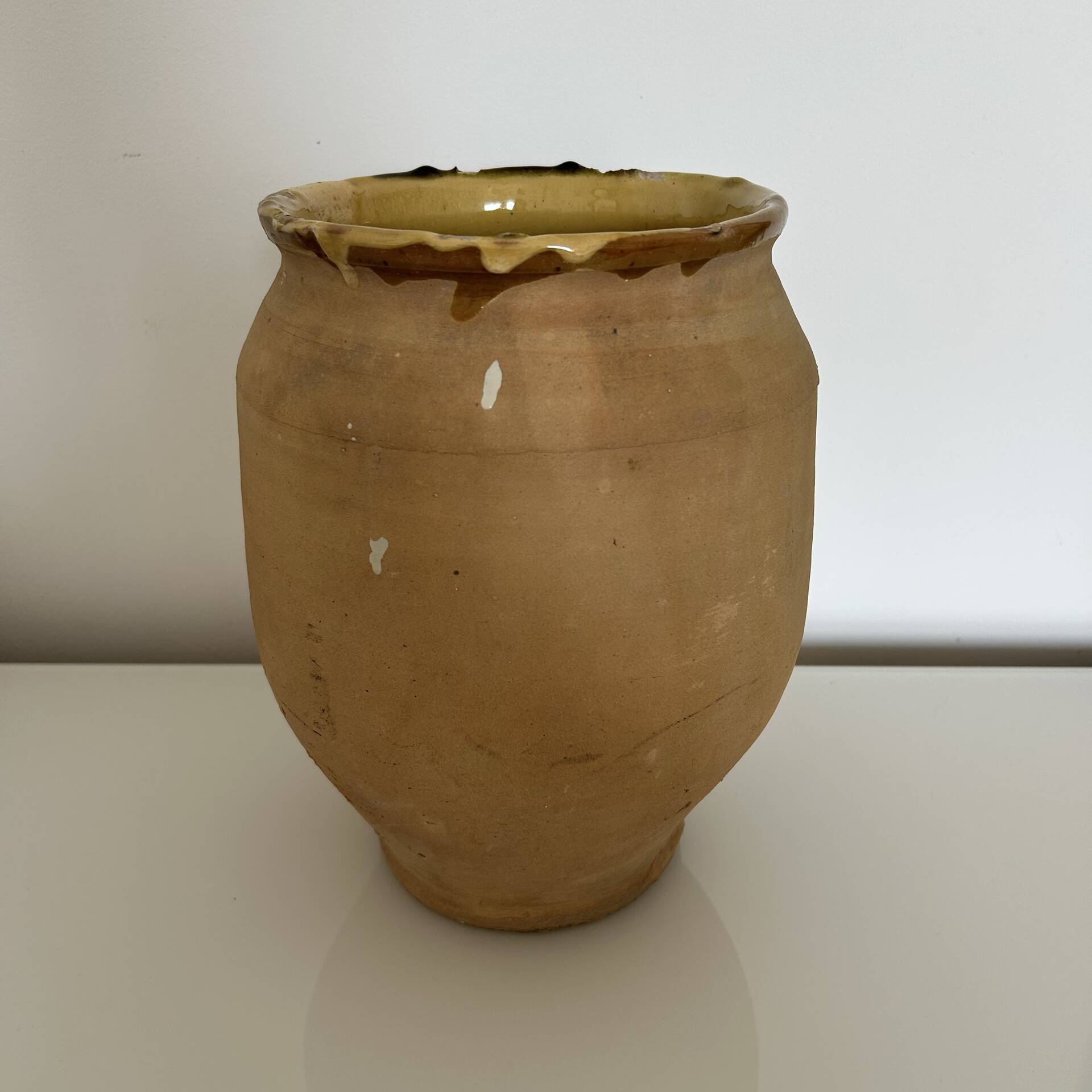 Old jar with brushstroke decoration