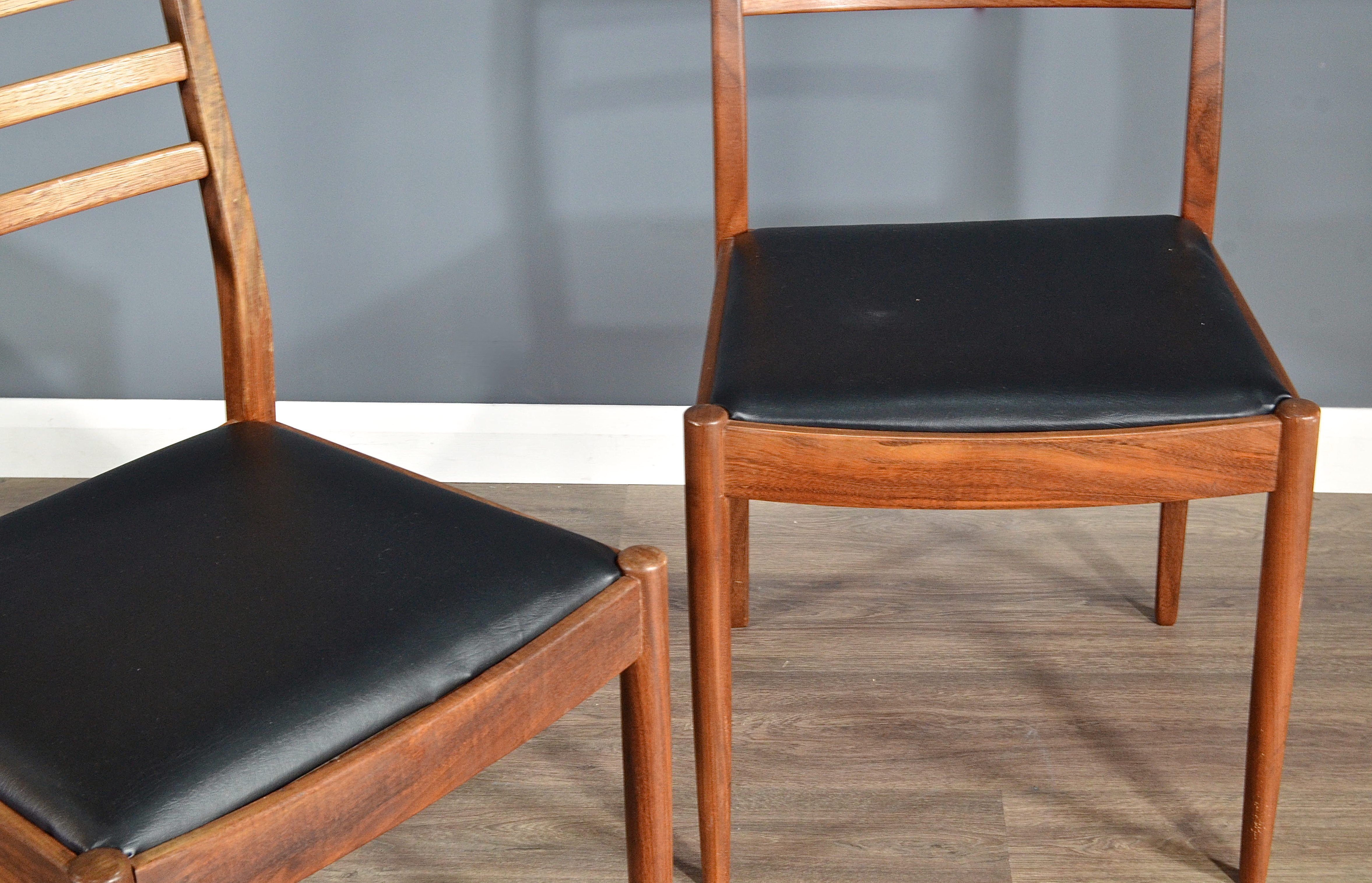 Set of 4 chairs by G Plan in teak and leatherette
