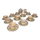 11 St Amand glazed stoneware cups and saucers/sugar bowl/milk jug