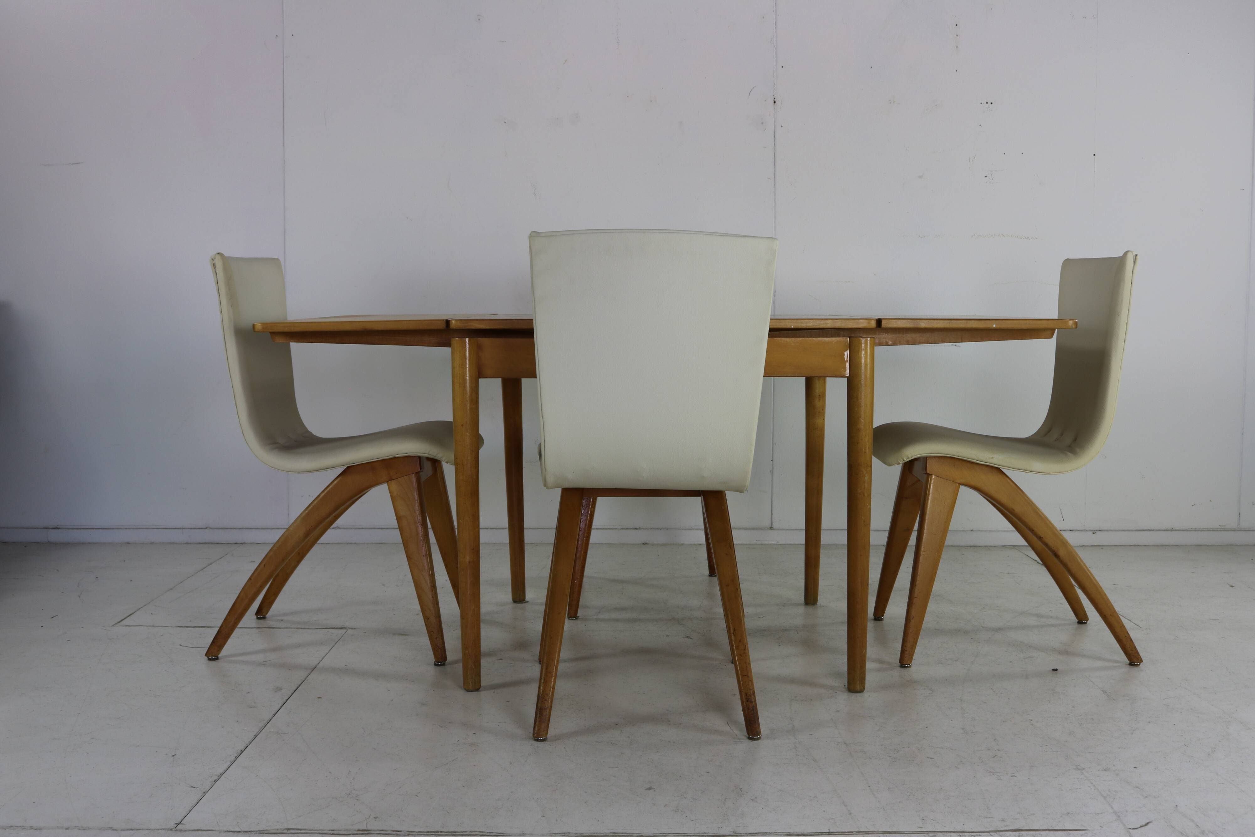 Set of four organic design dining chairs by G.J van Os