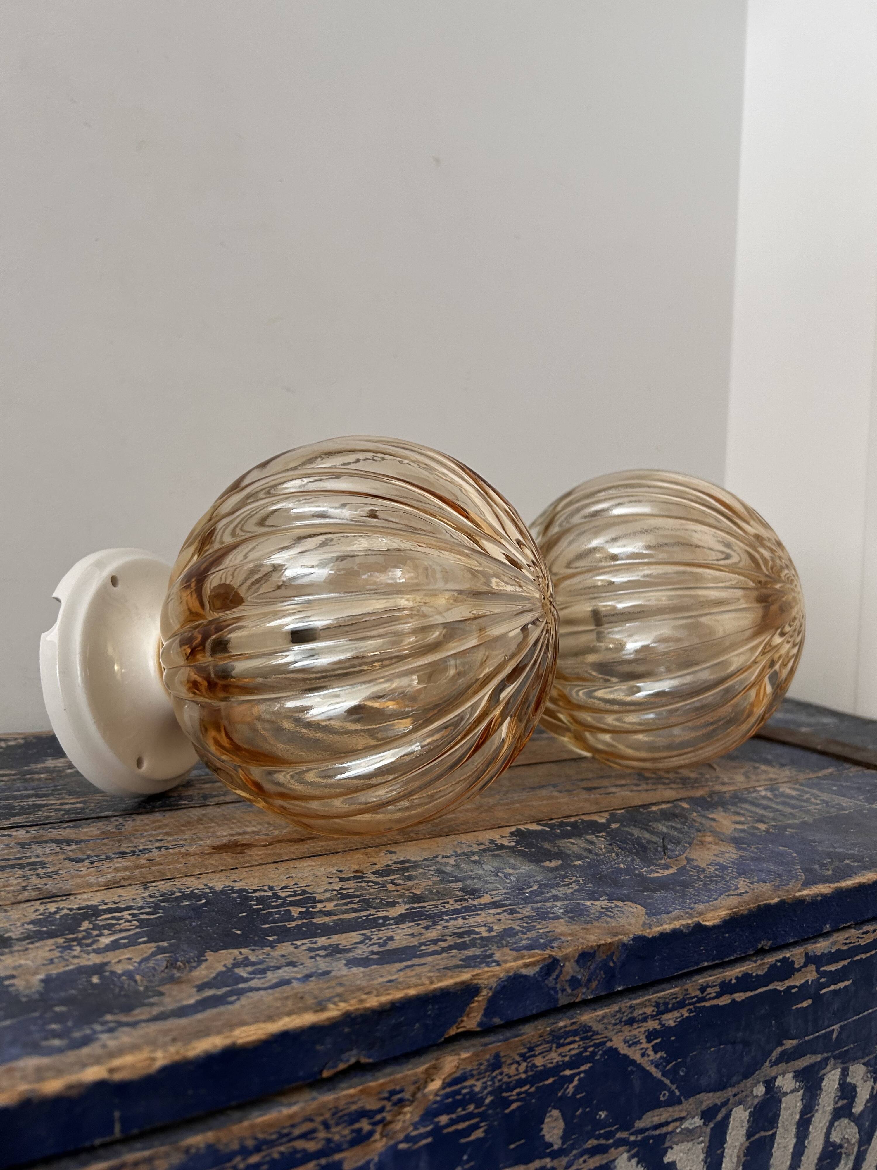 Pair of vintage golden globe wall or ceiling lights