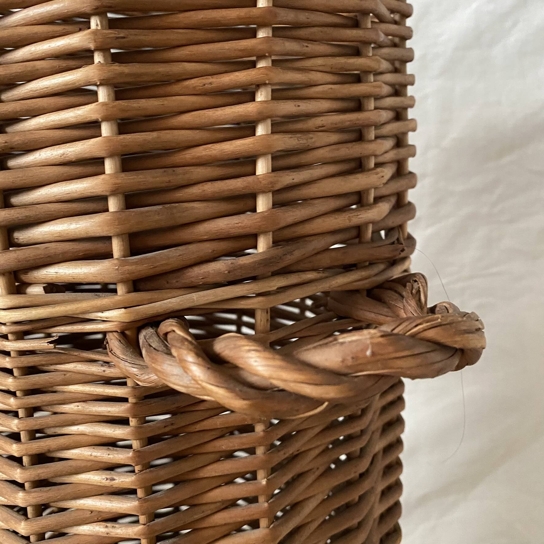 Woven wicker basket, vintage rod holder