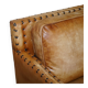 Three-seater leather canapé in Edwardian style with studs.
