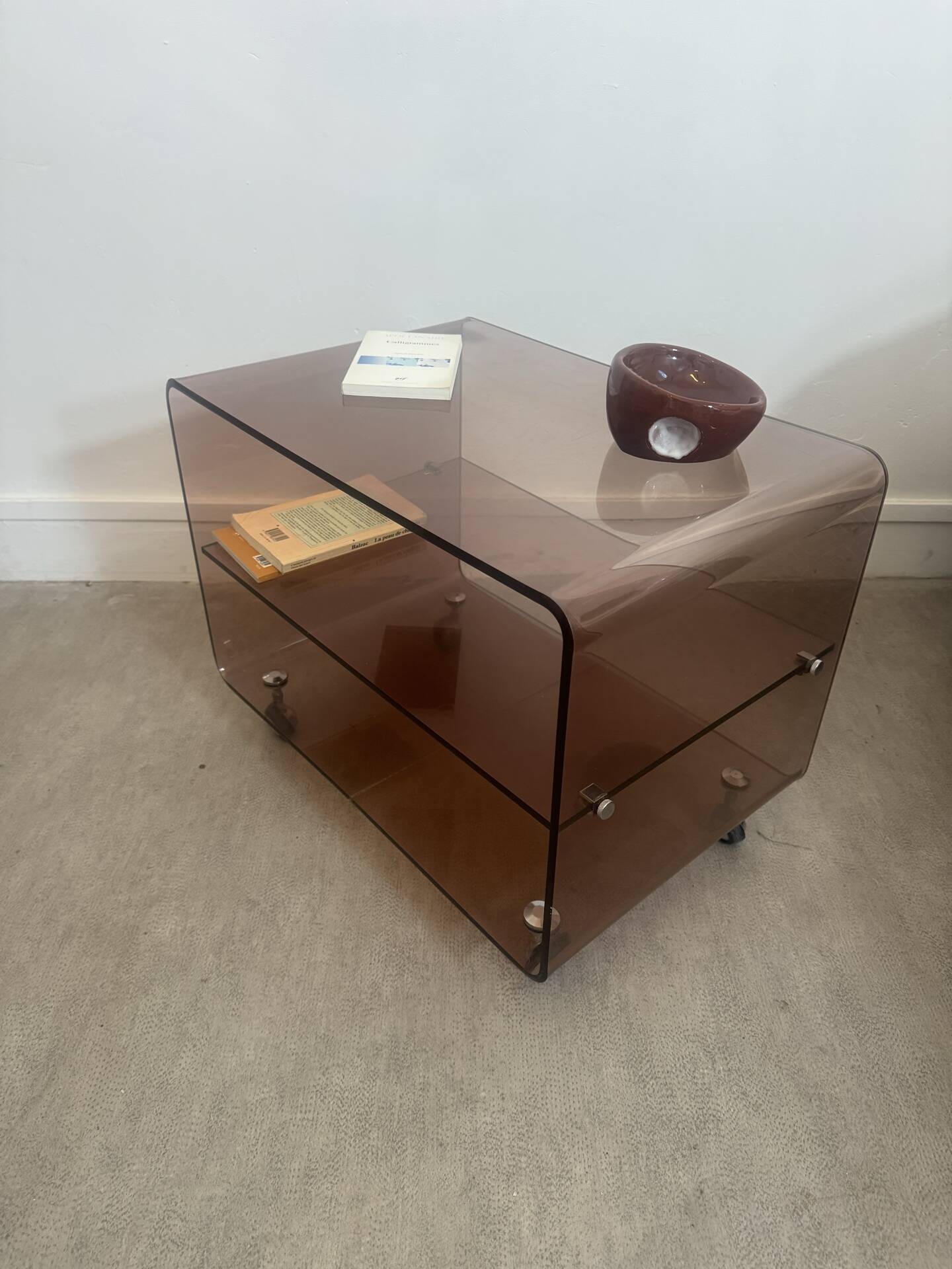 Coffee table / serving table in smoked plexiglass by Michel Dumas