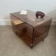 Coffee table / serving table in smoked plexiglass by Michel Dumas