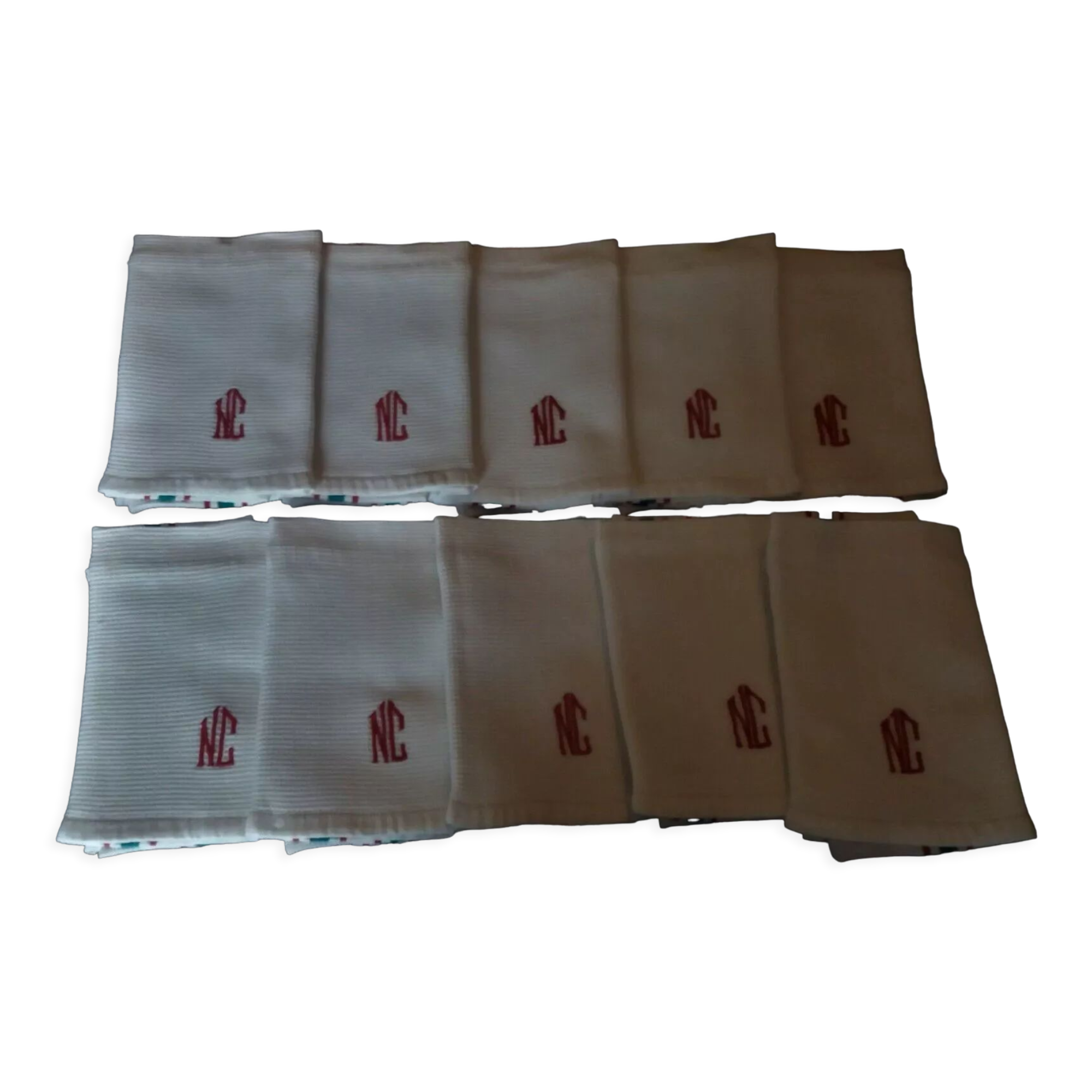 Set of ten antique cotton honeycomb towels hand-embroidered figure