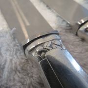 12 silver plated table knives by Argit goldsmith? Art Deco floral bands
