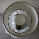 Glazed ceramic ball lamp signed Bossis with a fabric shade.