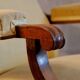 Fauteuil voltaire à oreilles, tissu jaune, XXe siècle