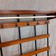 Wall coat rack in teak and vintage black metal