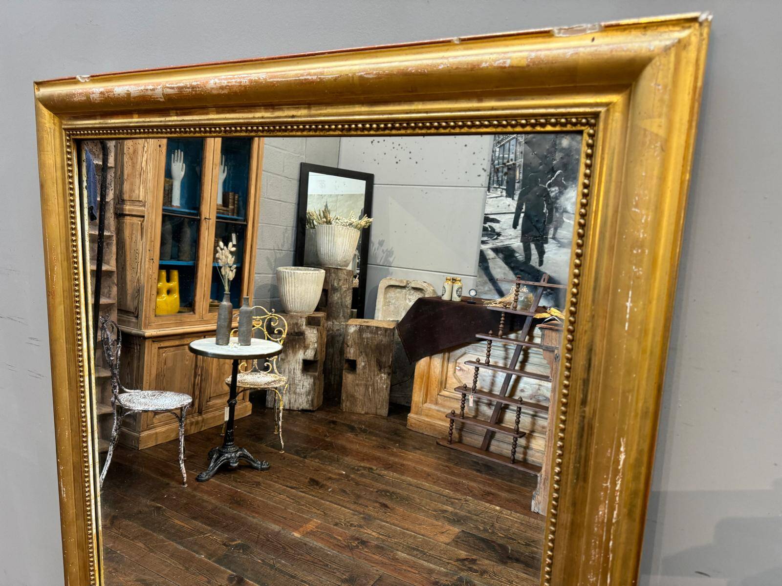 Antique gilded fireplace mirror