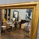Antique gilded fireplace mirror