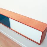 Vintage mid-century wall hung oak cabinets, blue & white sliding glass door