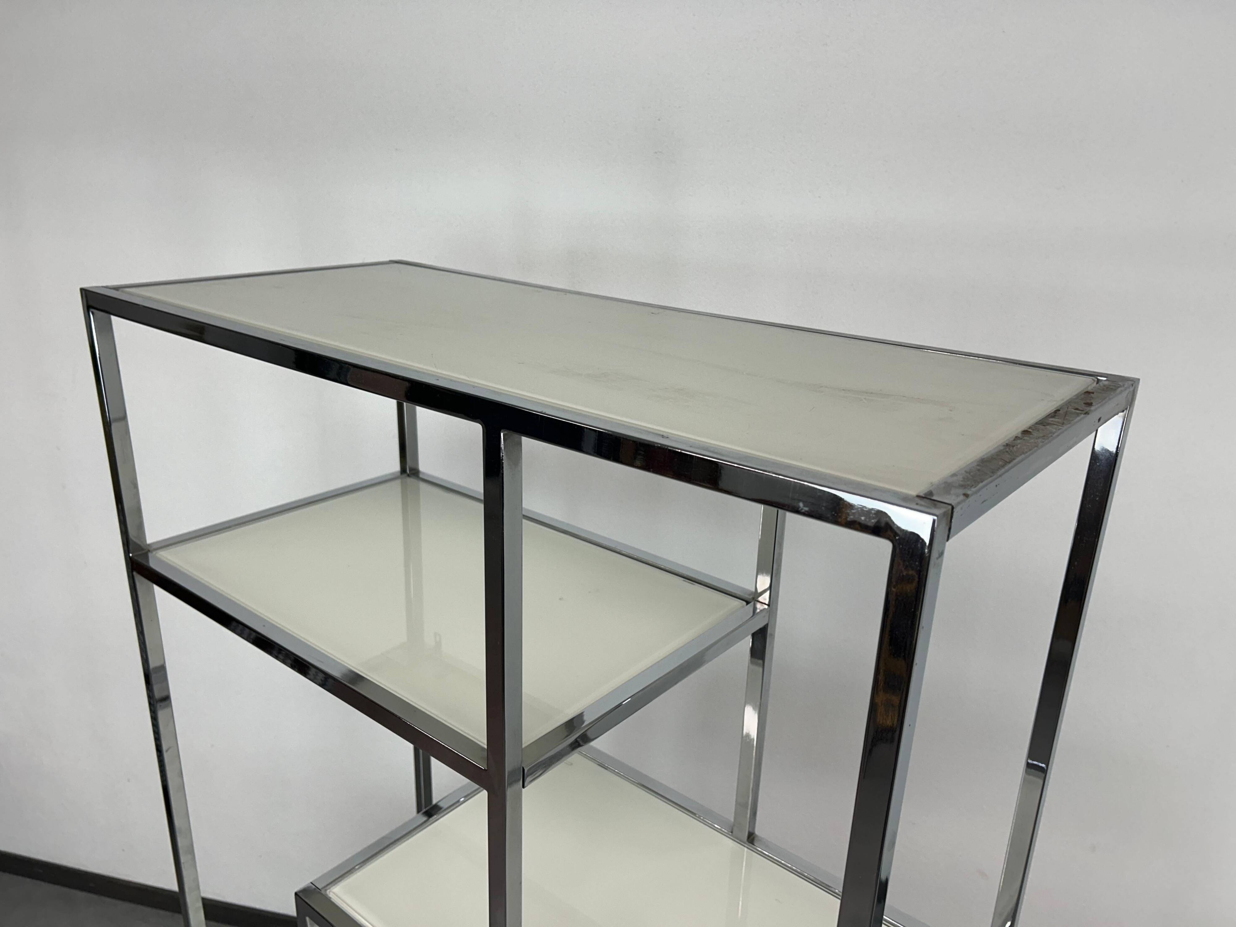 Mid-century modern chrome shelf by Milo Baughman