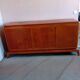 Large vintage sideboard with compass legs.