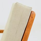 Vintage armchair in khaki corduroy, mid-century modern design from the 1960s.