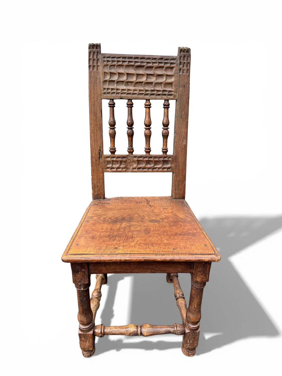 Rare high chair from the 16th/17th century in solid oak.