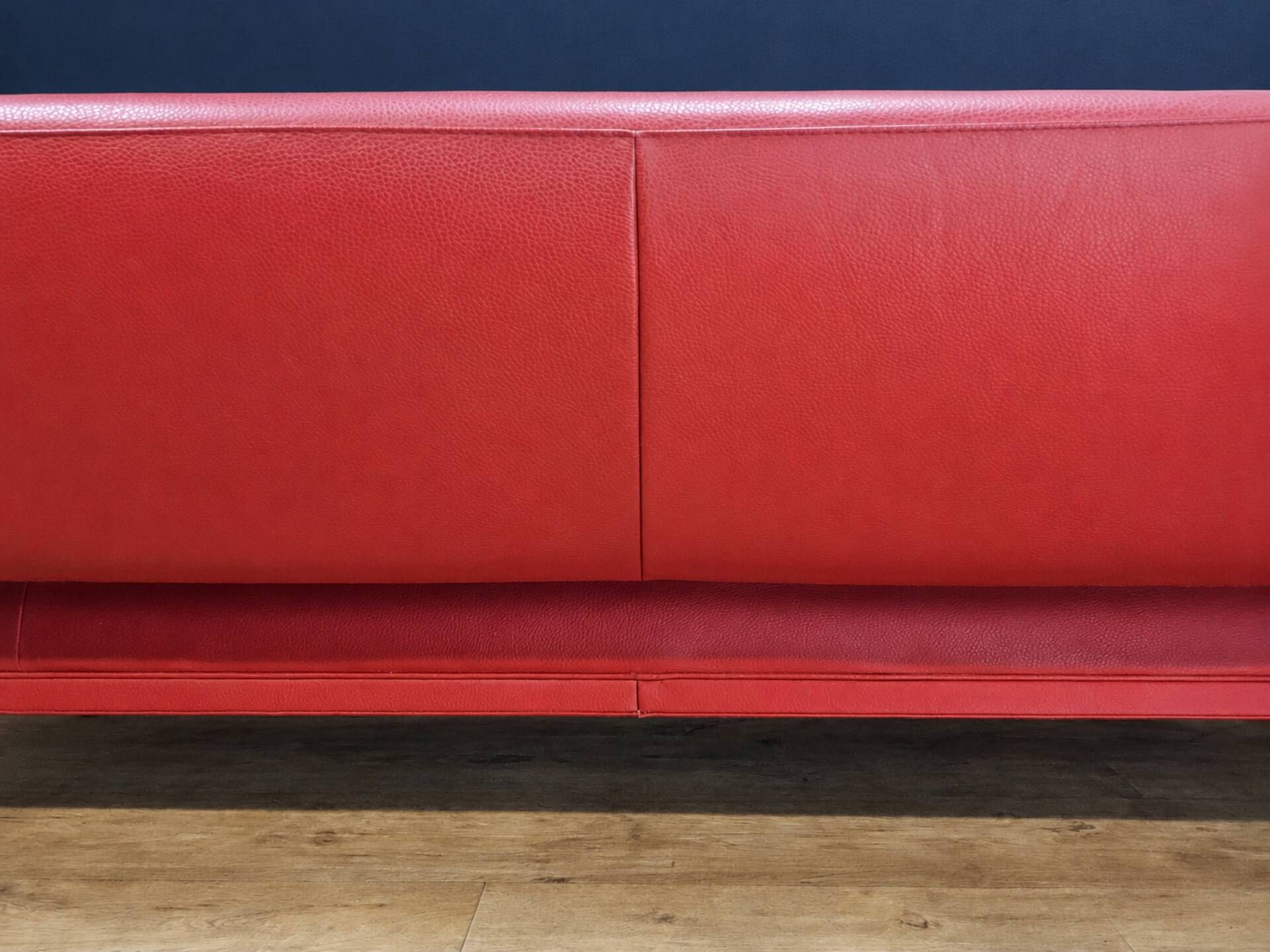 Vintage red leather Leolux Arabella design sofa used