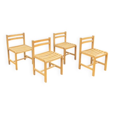 Ensemble de 4 chaises bois vernis, André Sornay