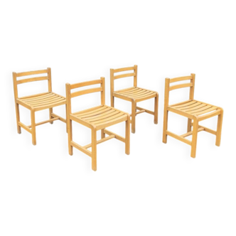 Set of 4 varnished wooden chairs, André Sornay
