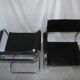 Paire de fauteuils type B34