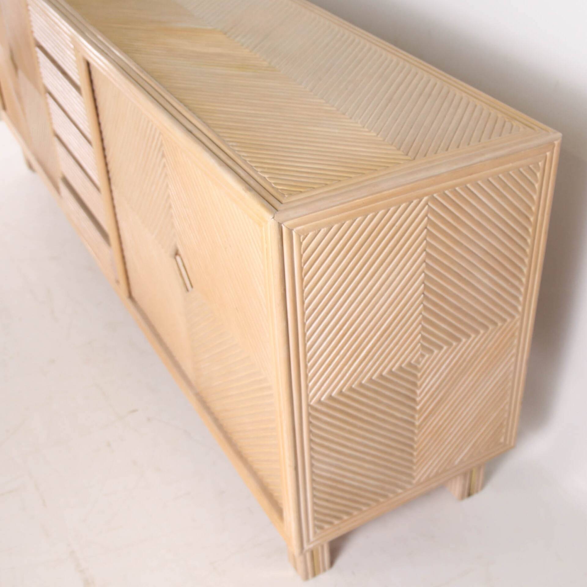 Rattan and brass sideboard