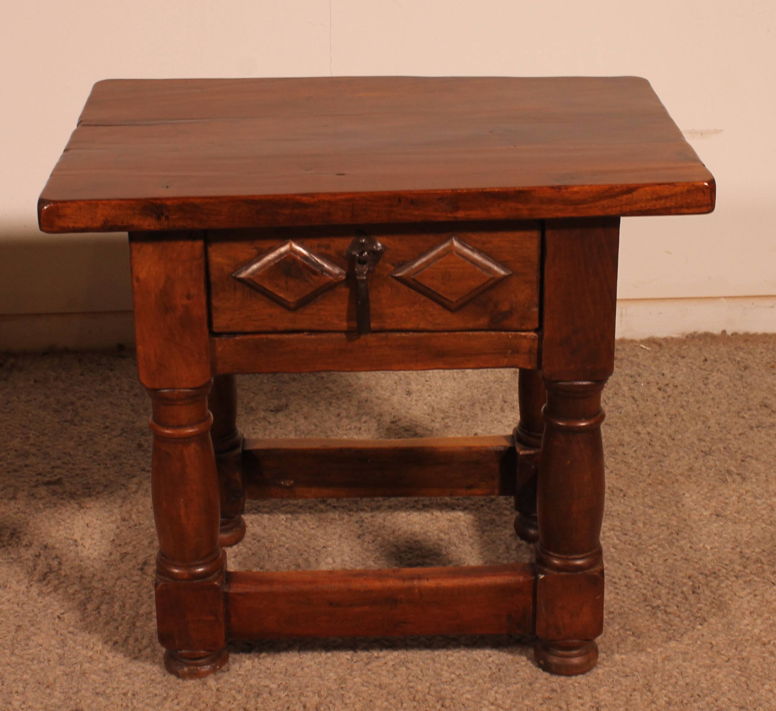 pair of Spanish walnut bedside tables