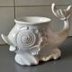 Dolphin-shaped cache pot, 1970