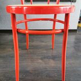 Red metal chair 90s