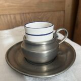 Pewter and porcelain cup and saucer