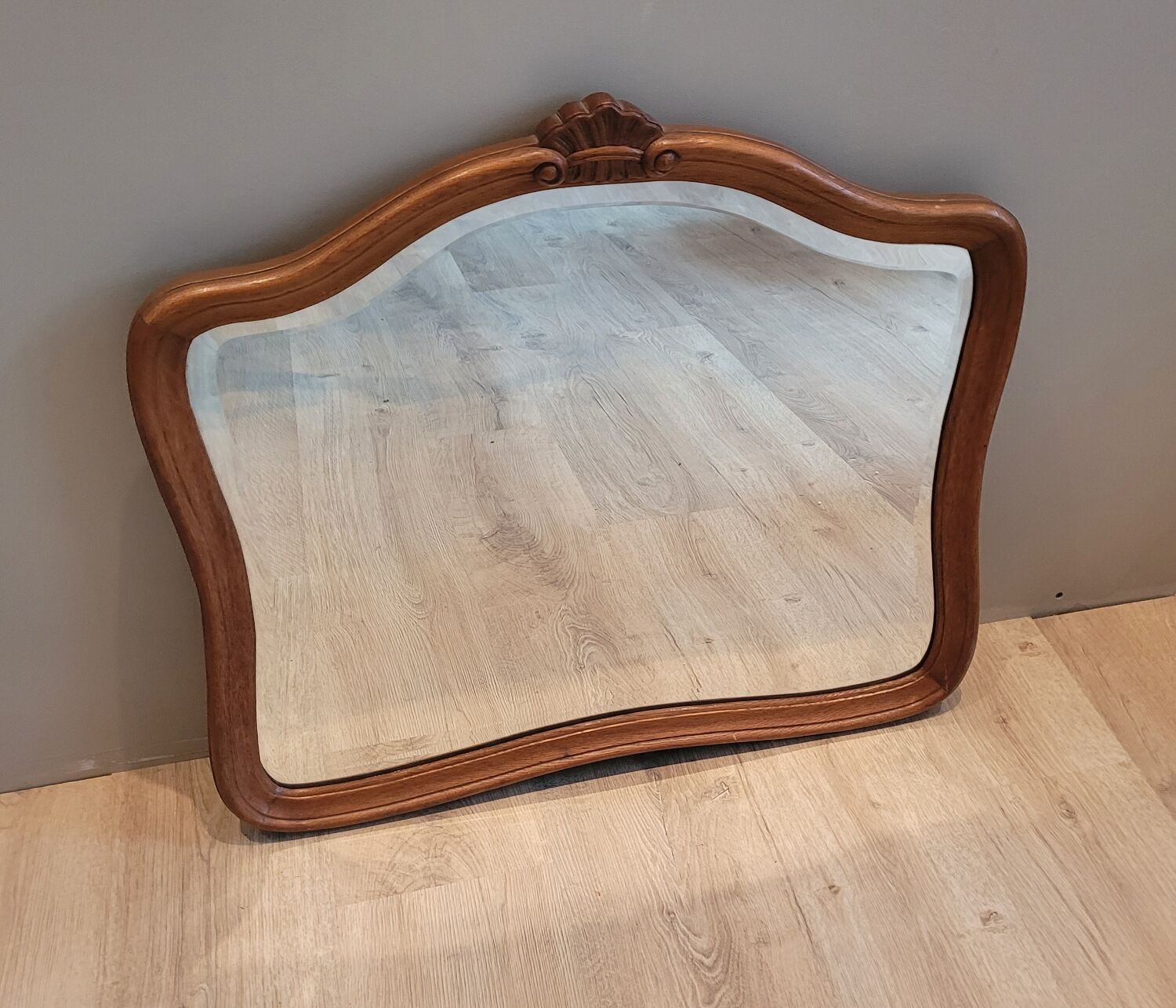 Elongated wooden mirror