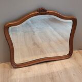 Elongated wooden mirror