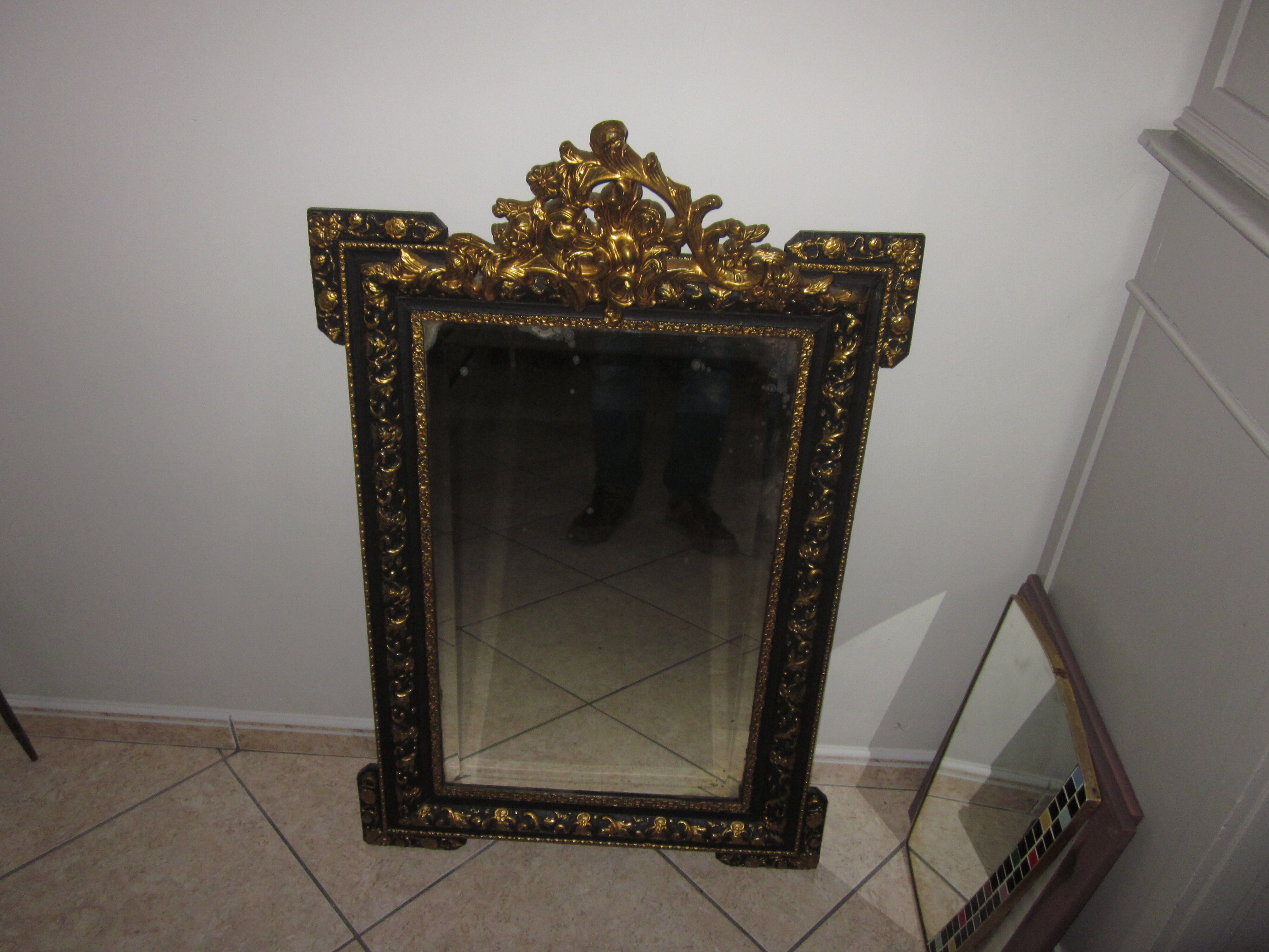 Old mirror with pediment