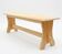Rustic monastery-style table bench made of raw solid pine.