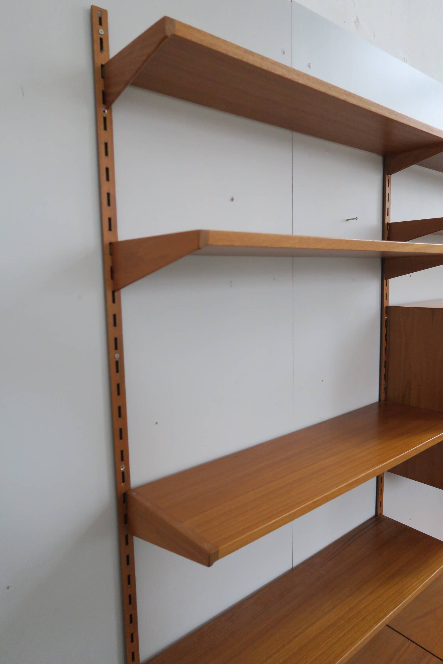 danish wall shelf unit in teak from the 60s by Kai Kristiansen