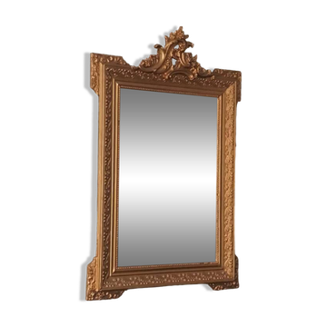 Louis XV style gilded mirror and carved wooden frame