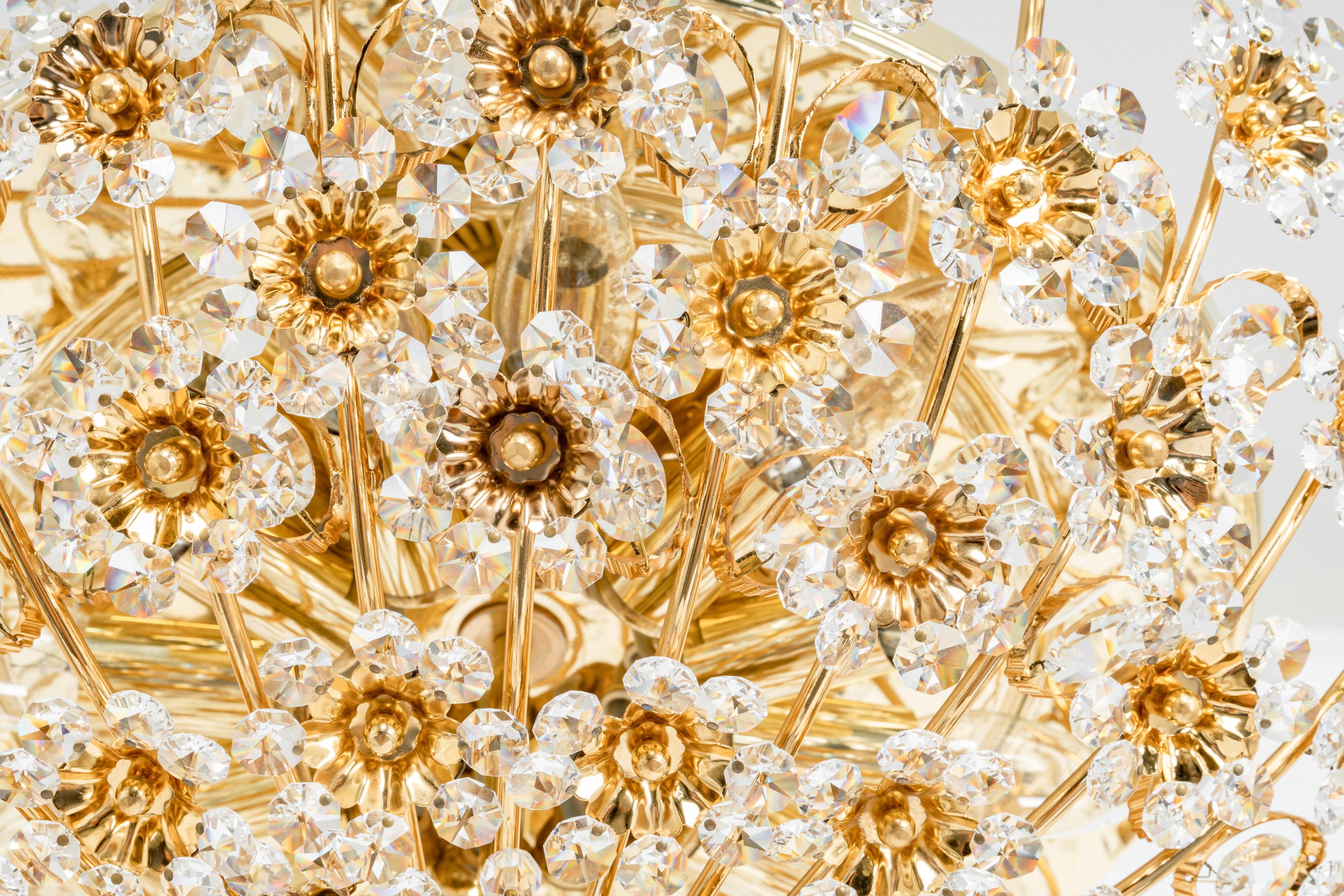 Small delicate ceiling light in gilded brass and cut glass in the shape of flowers by Palwa, Germany, 1970s.