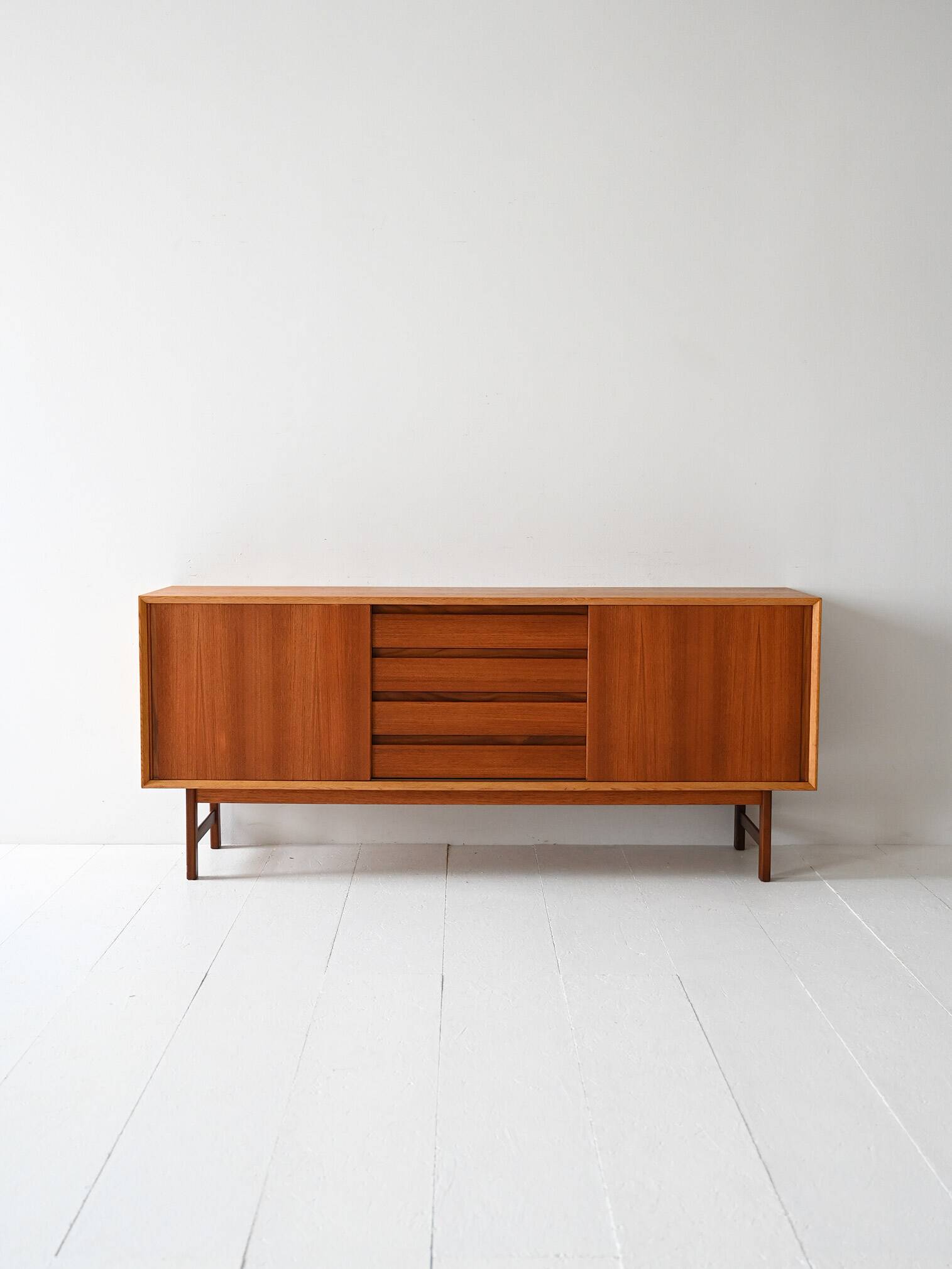Vintage Scandinavian teak sideboard with metal-lined drawers