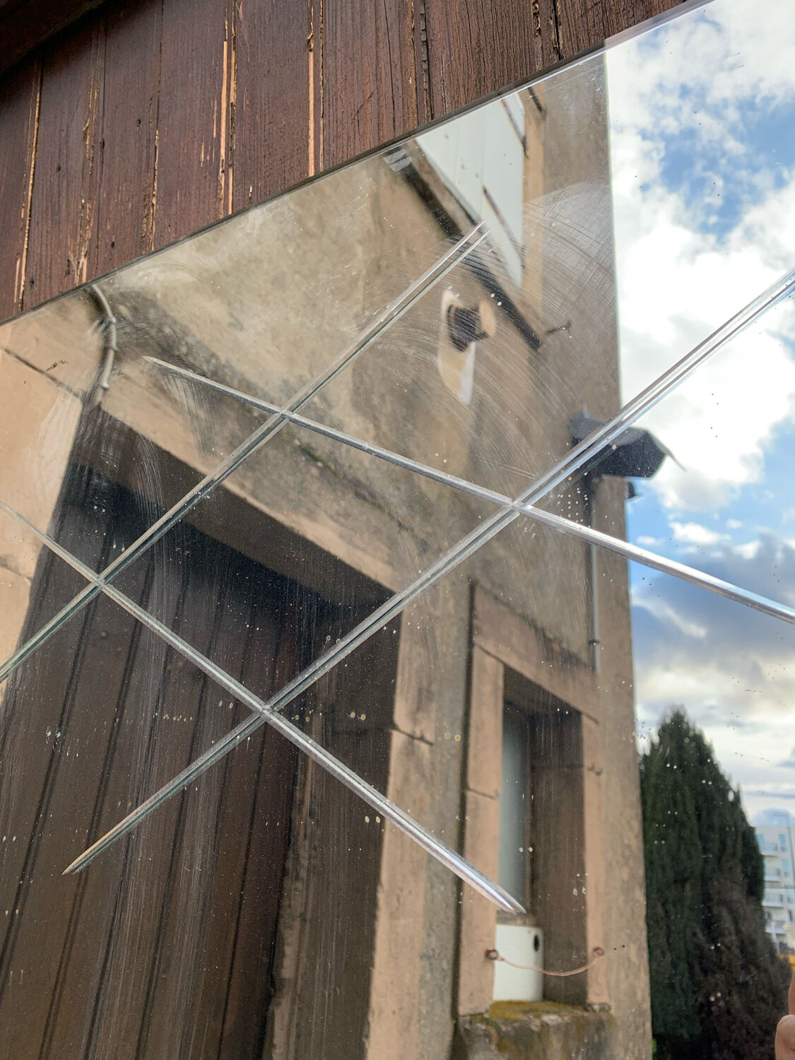 Marly brothers chiseled mirror in burgundy made in France 1950-1960