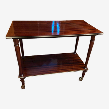 Table served two levels on mahogany and brass wheels 1960-1970