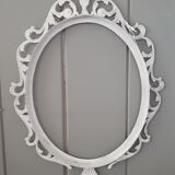 Grey patinated oval frame