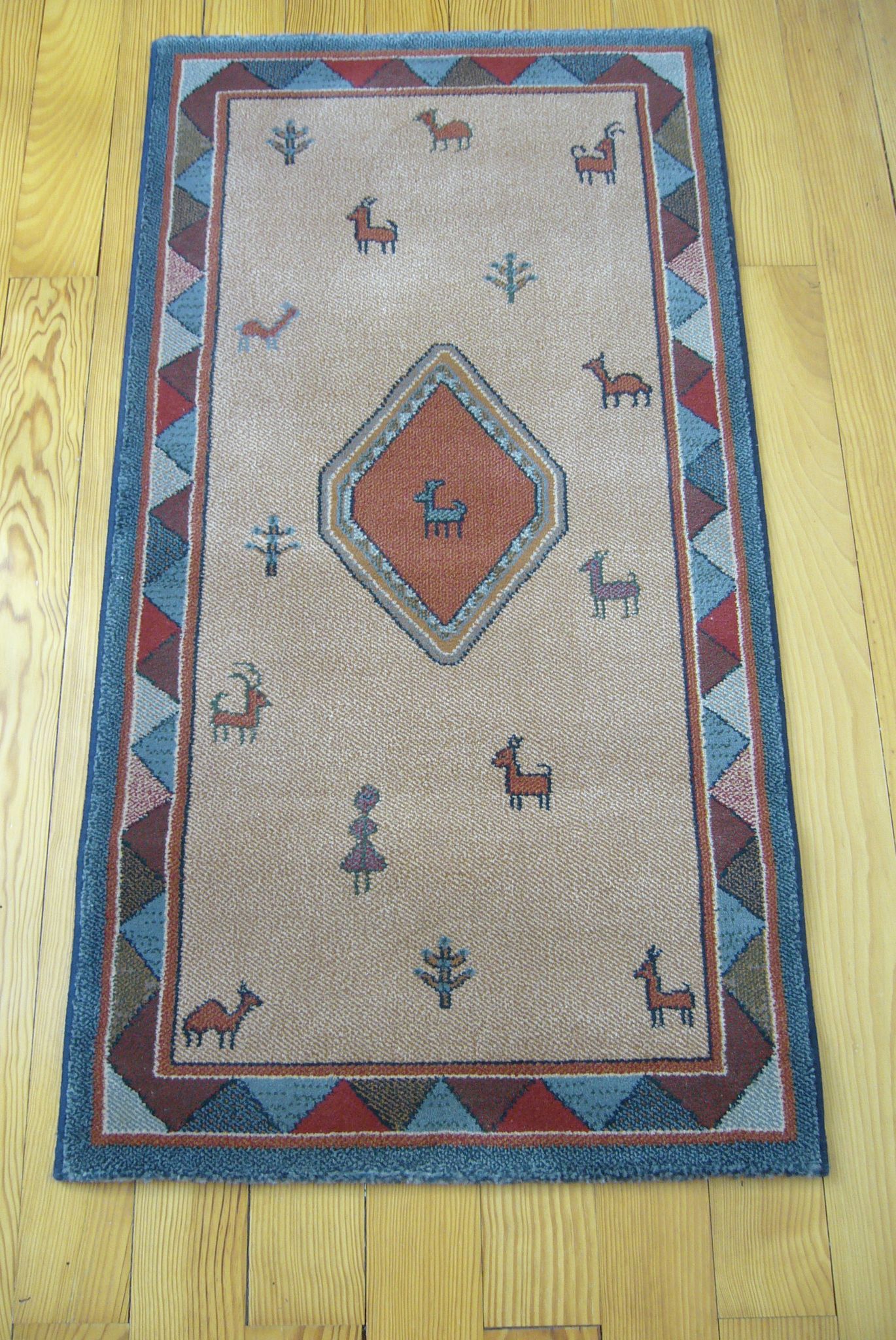Pair of 60 x 120 Peruvian wool rugs