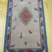 Pair of 60 x 120 Peruvian wool rugs