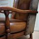 English high back cognac leather wingchair by Criterion cord