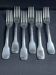 6 fourchettes de table en métal argenté Frionnet François